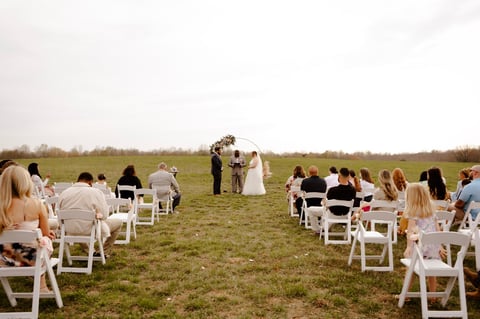 Outdoor wedding ceremony in an open field